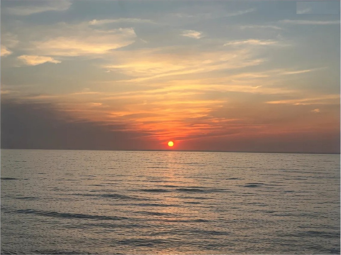大浴場から望む日本海の夕日